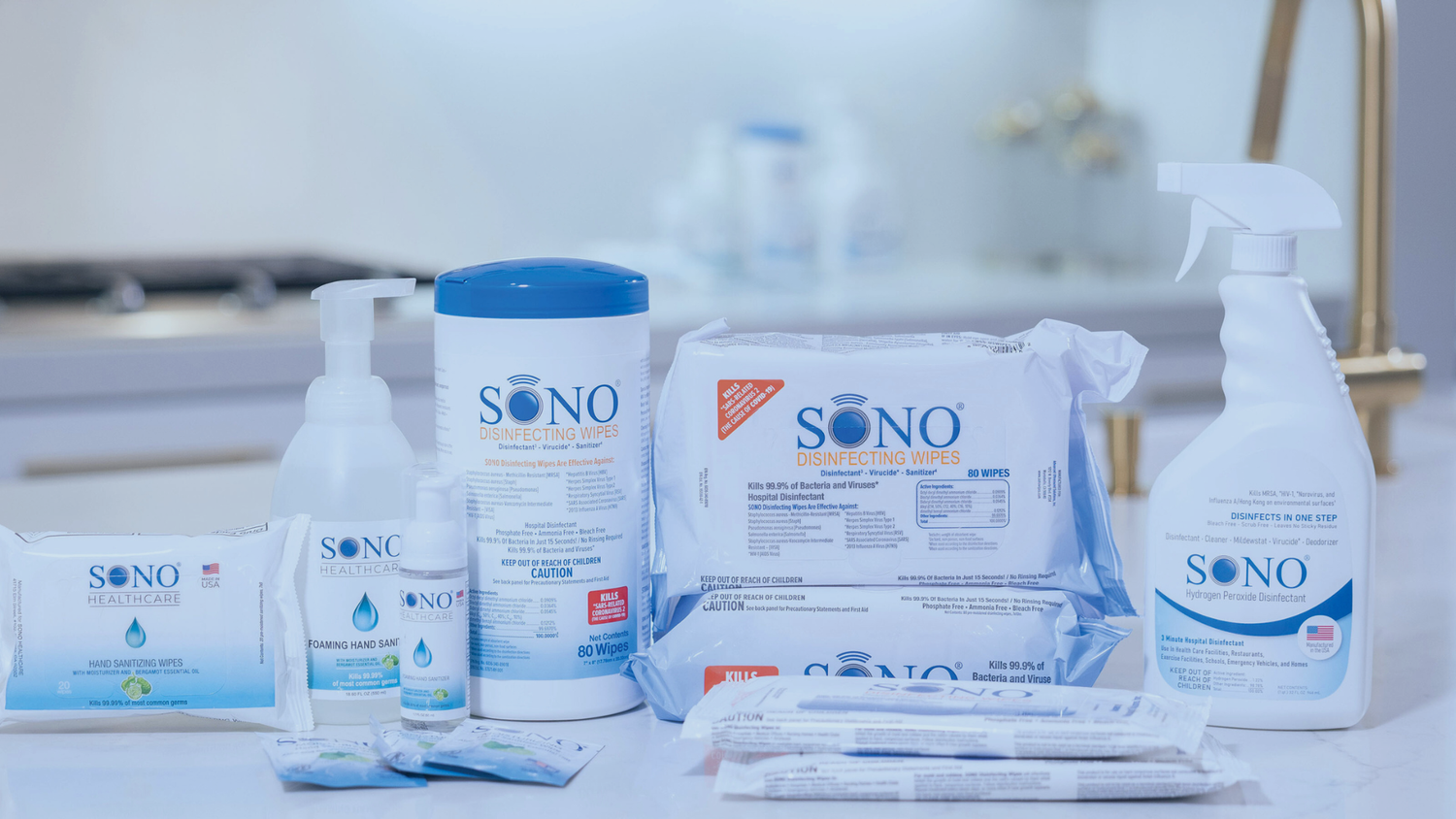 SONO cleaning products on a white surface with a blurred background