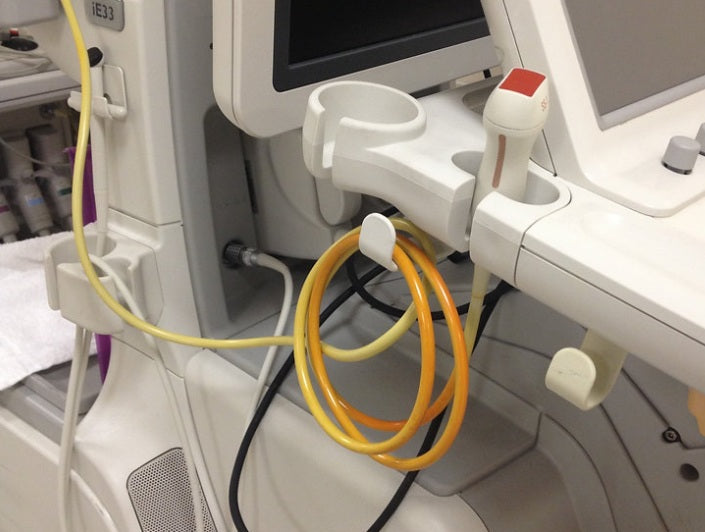 Medical device with multiple cables and attachments in a clinical setting